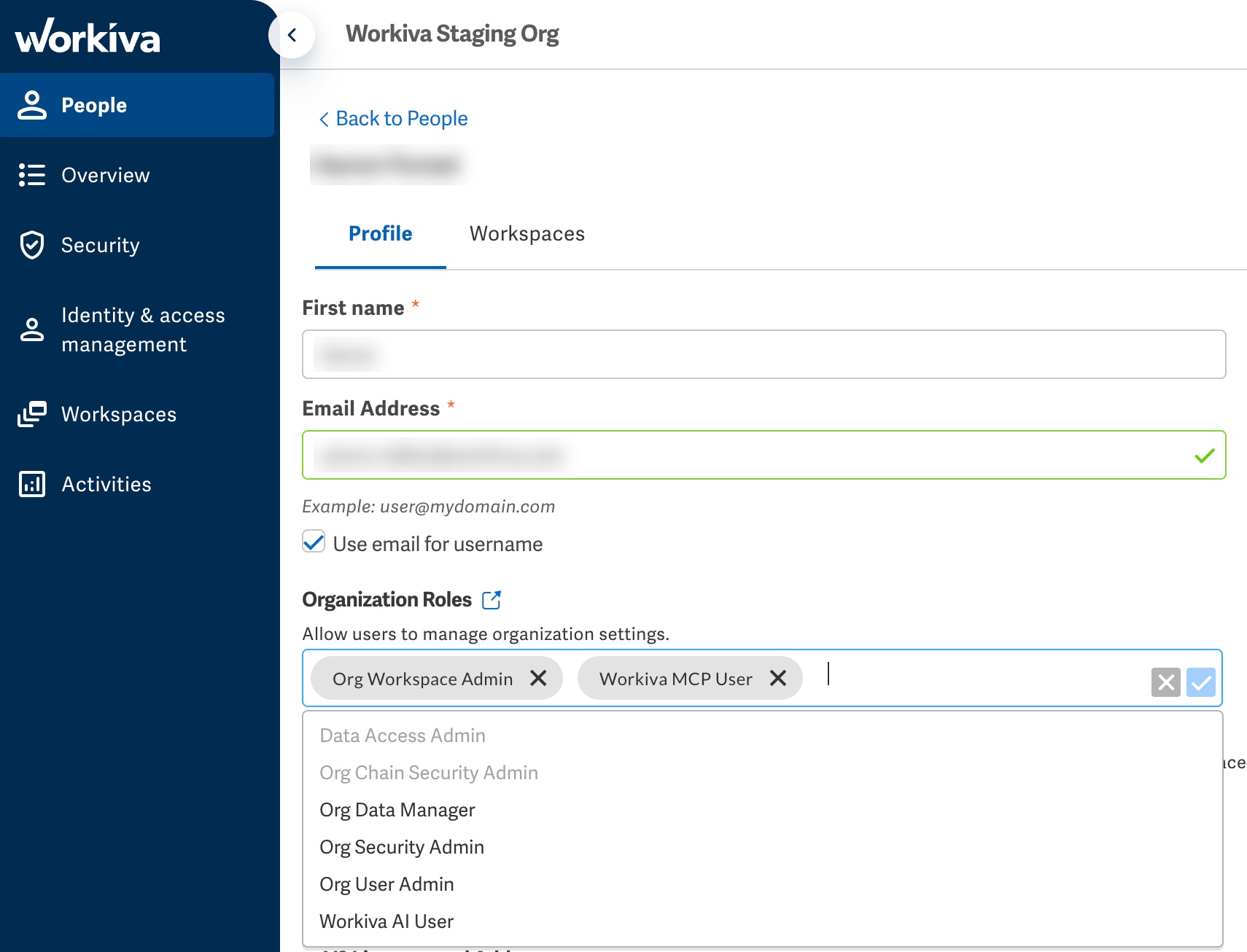 A user's Profile tab with Workiva MCP User added under Organization Roles